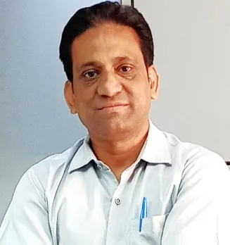 Dr. Devendra